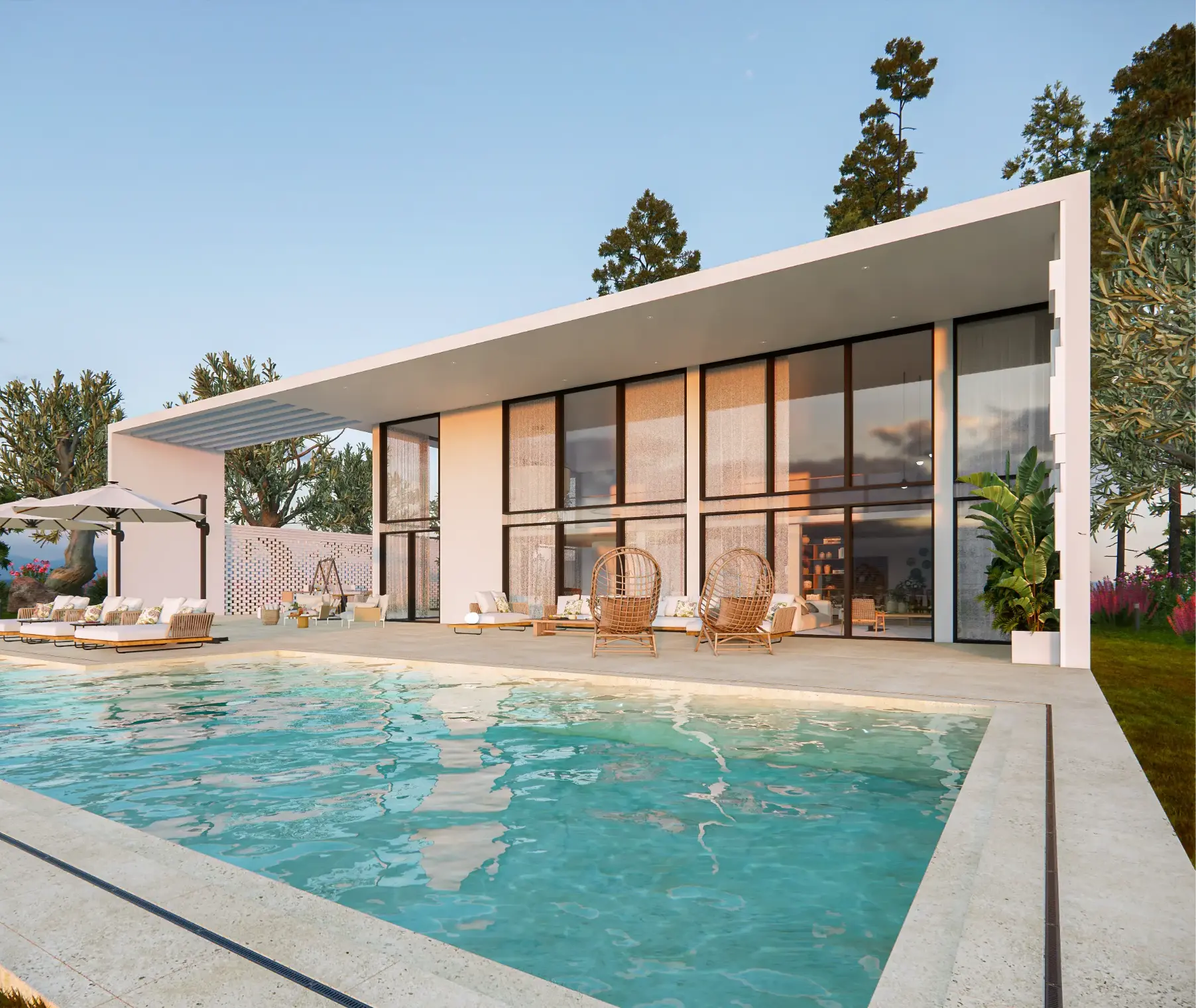 Imponente fachada da fantástica moradia de luxo com projeto de arquitetura de interiores e decoração assinados por Margarida Bugarim. Fachada, zona da piscina e de estar exterior de imponente moradia situada na zona de Cascais.